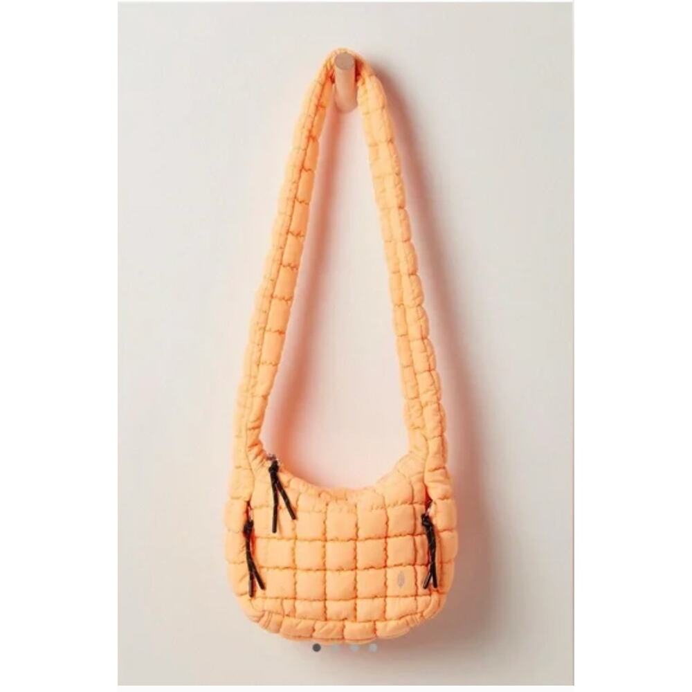 Free People Quilted Baby Carryall Sling Bag in Neon Clementine